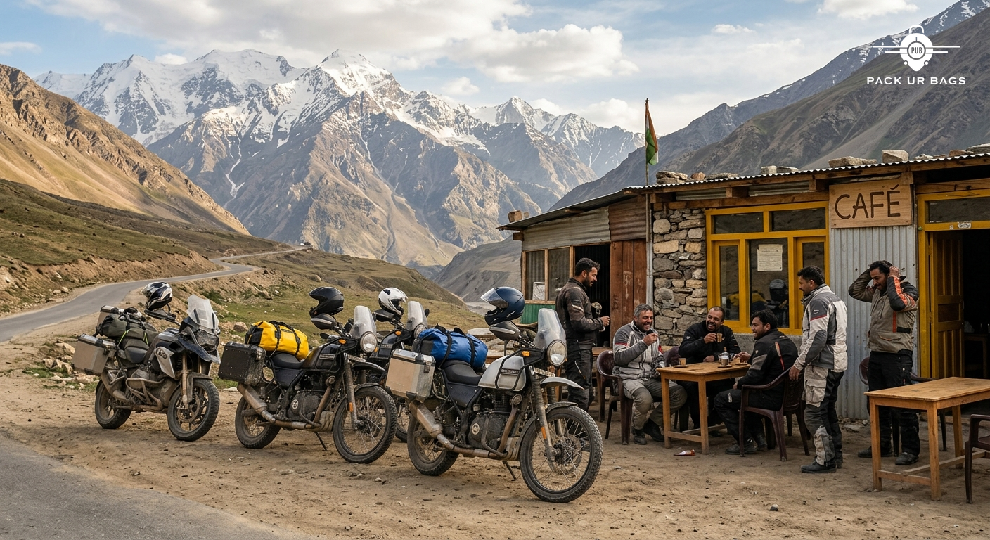 Group of bikers resting at roadside dhaba between Jispa and Sarchu, bikes parked outside, mountain backdrop, warm aftern